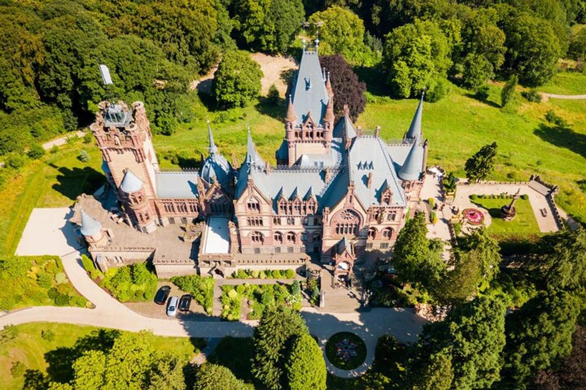 an aerial view of an estate with a castle