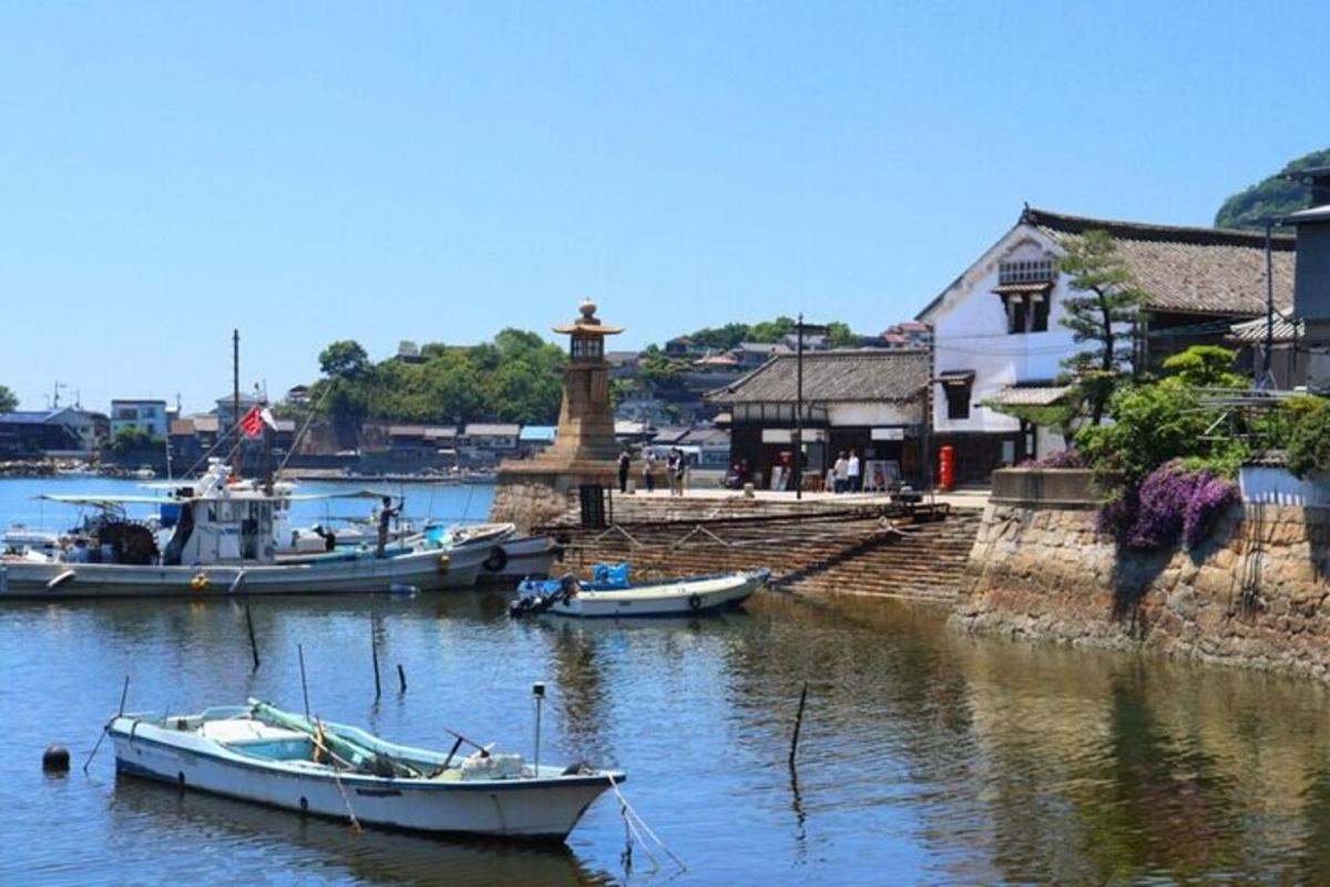 a group of boats docked in a body of water
