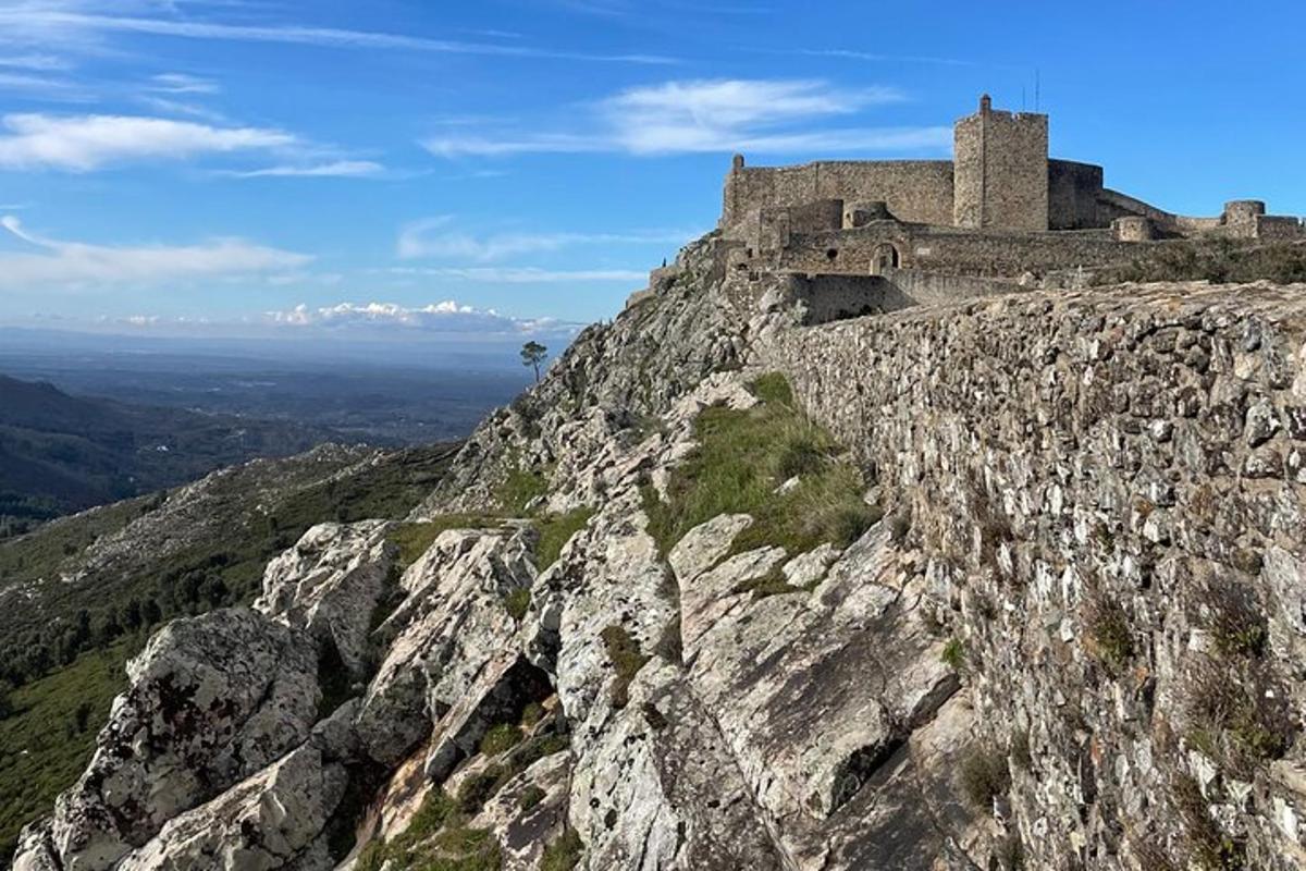 a castle on the side of a mountain