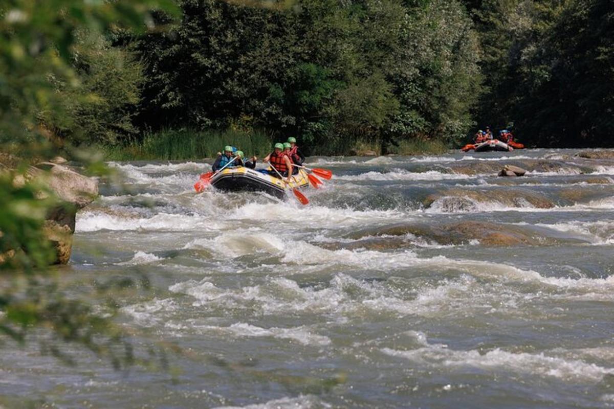 a group of people in a boat on a river