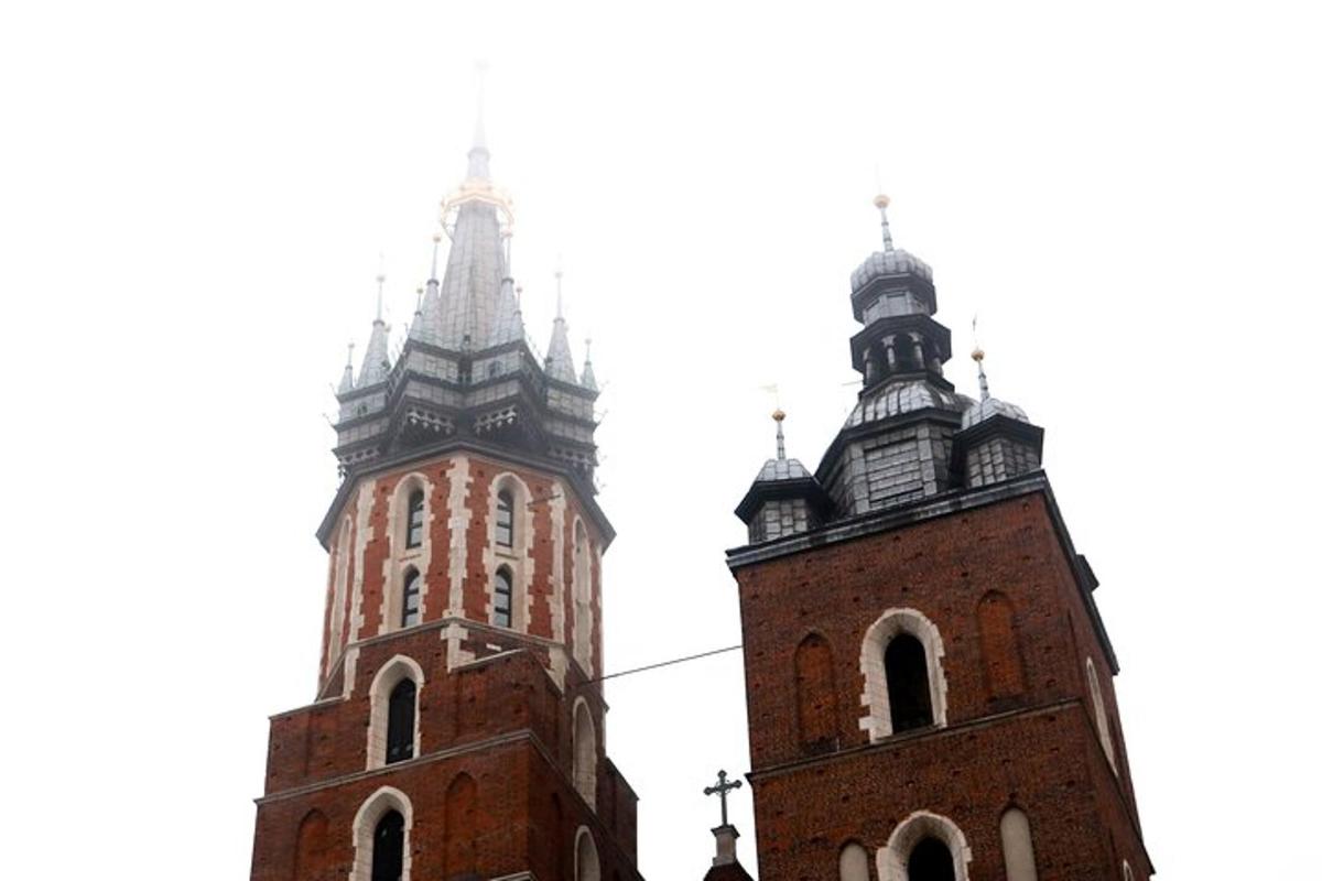 two tall towers of a church with two turrets