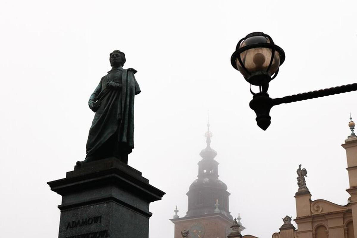 a statue and a street light in front of a building