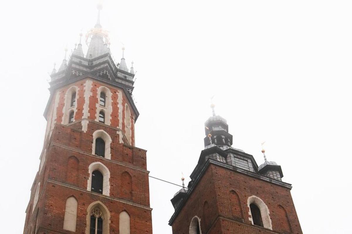 two towers of a brick building with two turrets