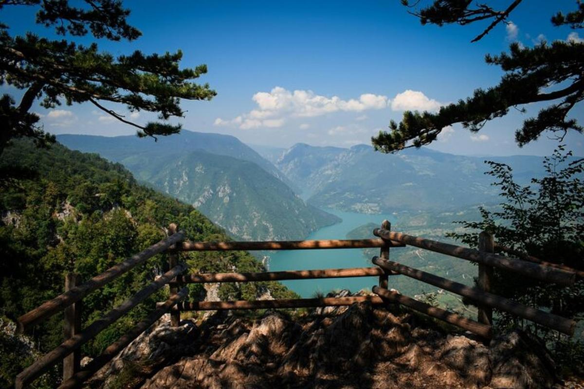 a view of a mountain with a view of a lake
