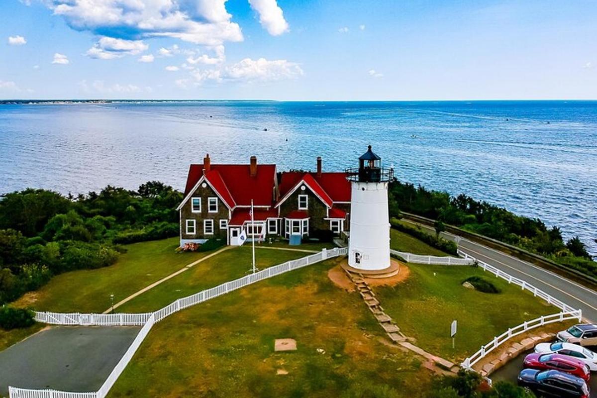 a lighthouse on an island in the water