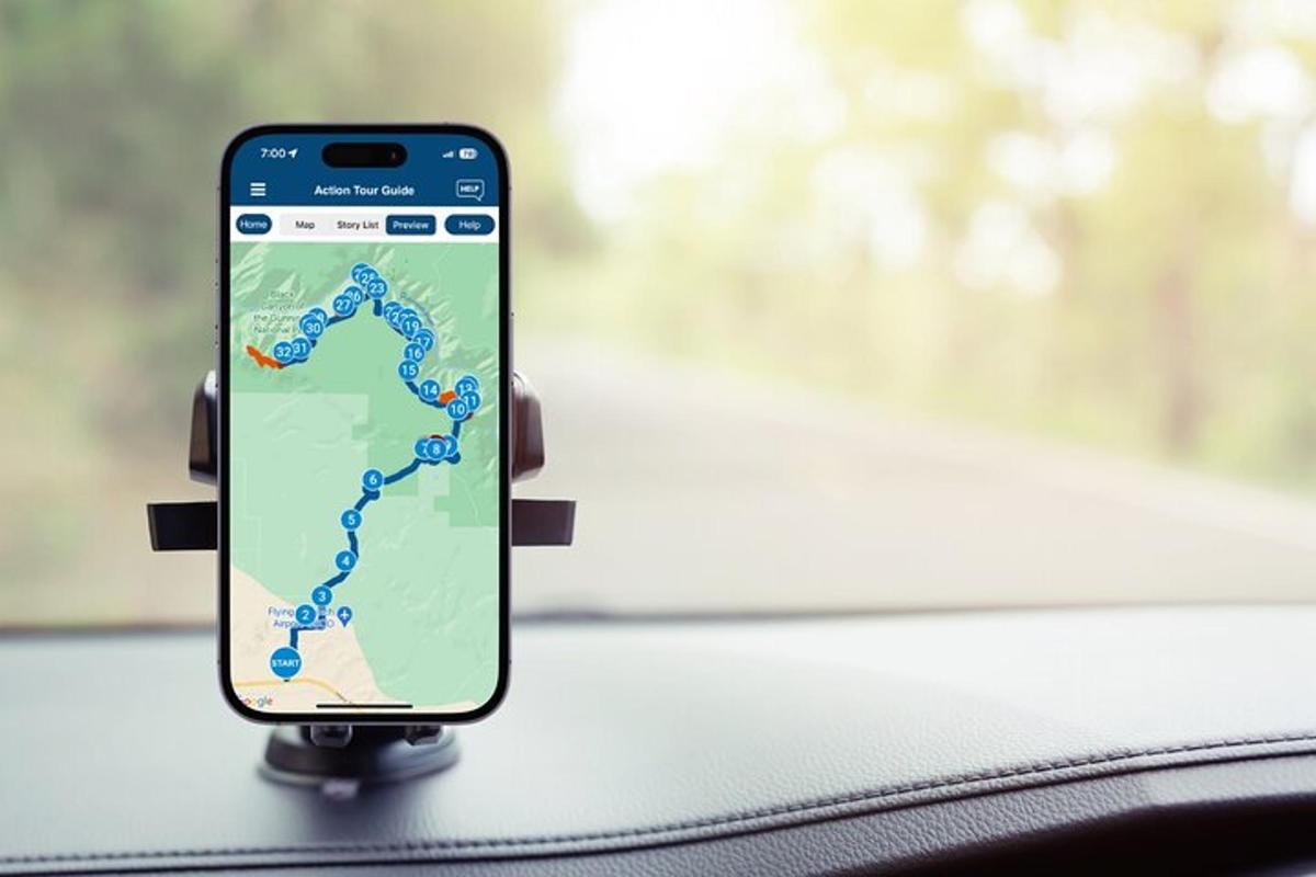 mobilní telefon v autě s mapou