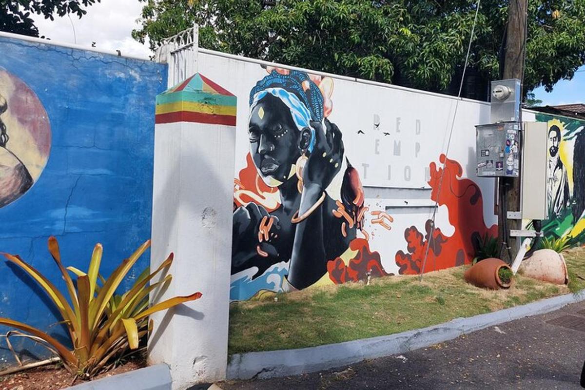 a wall with a mural of a woman on it