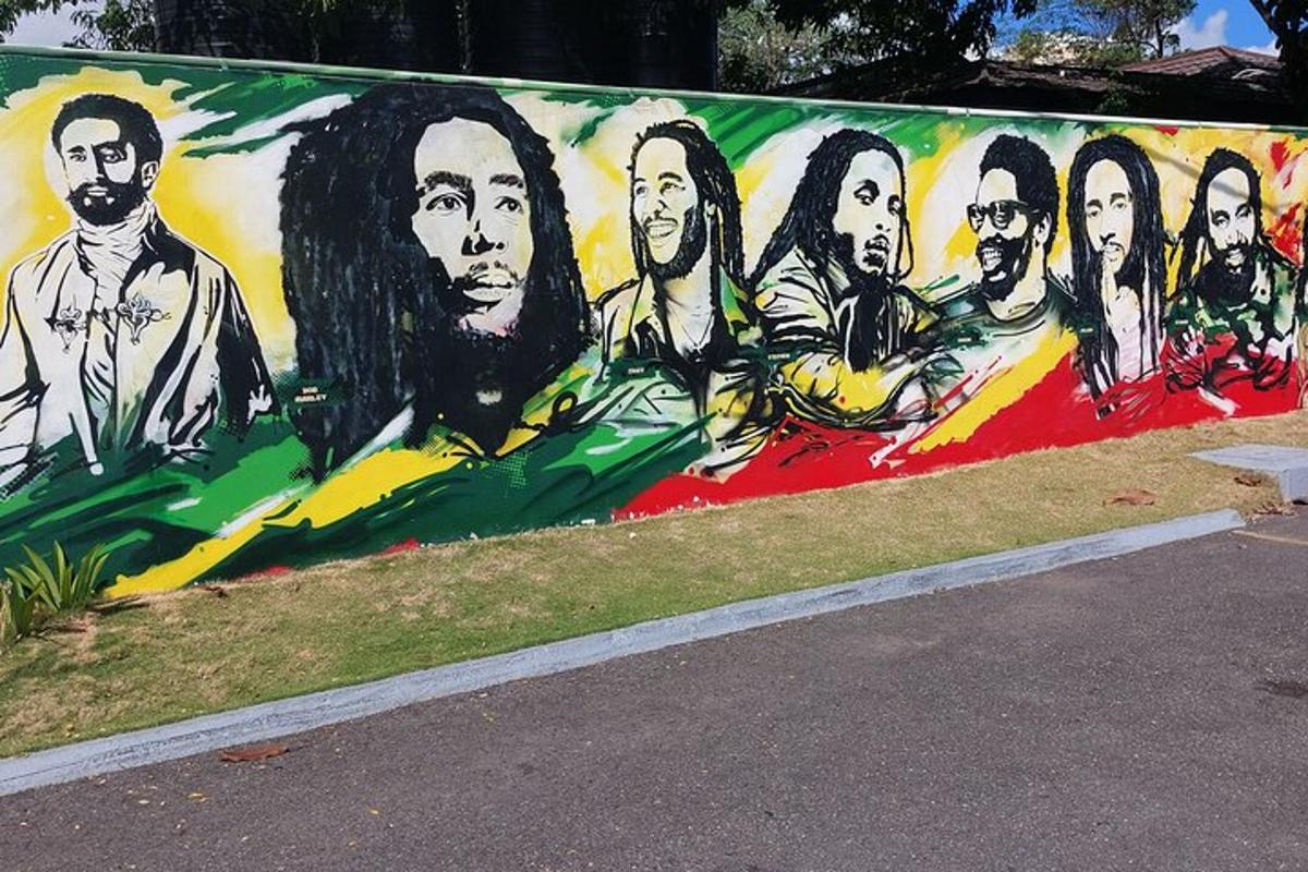 a wall with a painting of the beatles on it