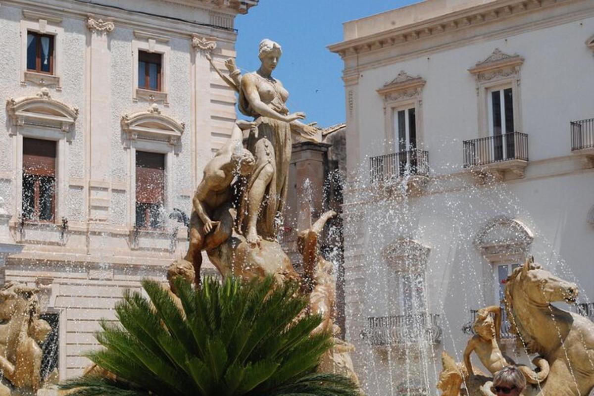 una fontana d'acqua davanti a un edificio