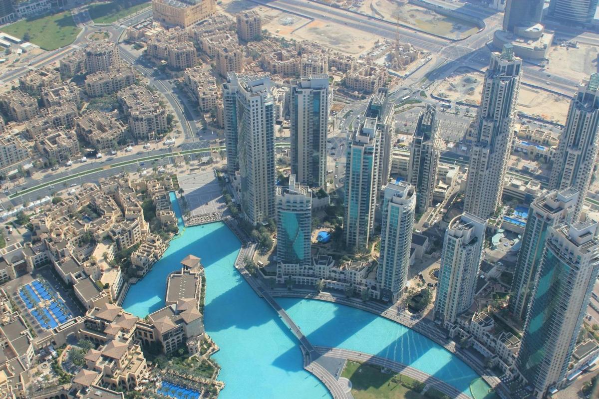 an aerial view of a city with a river