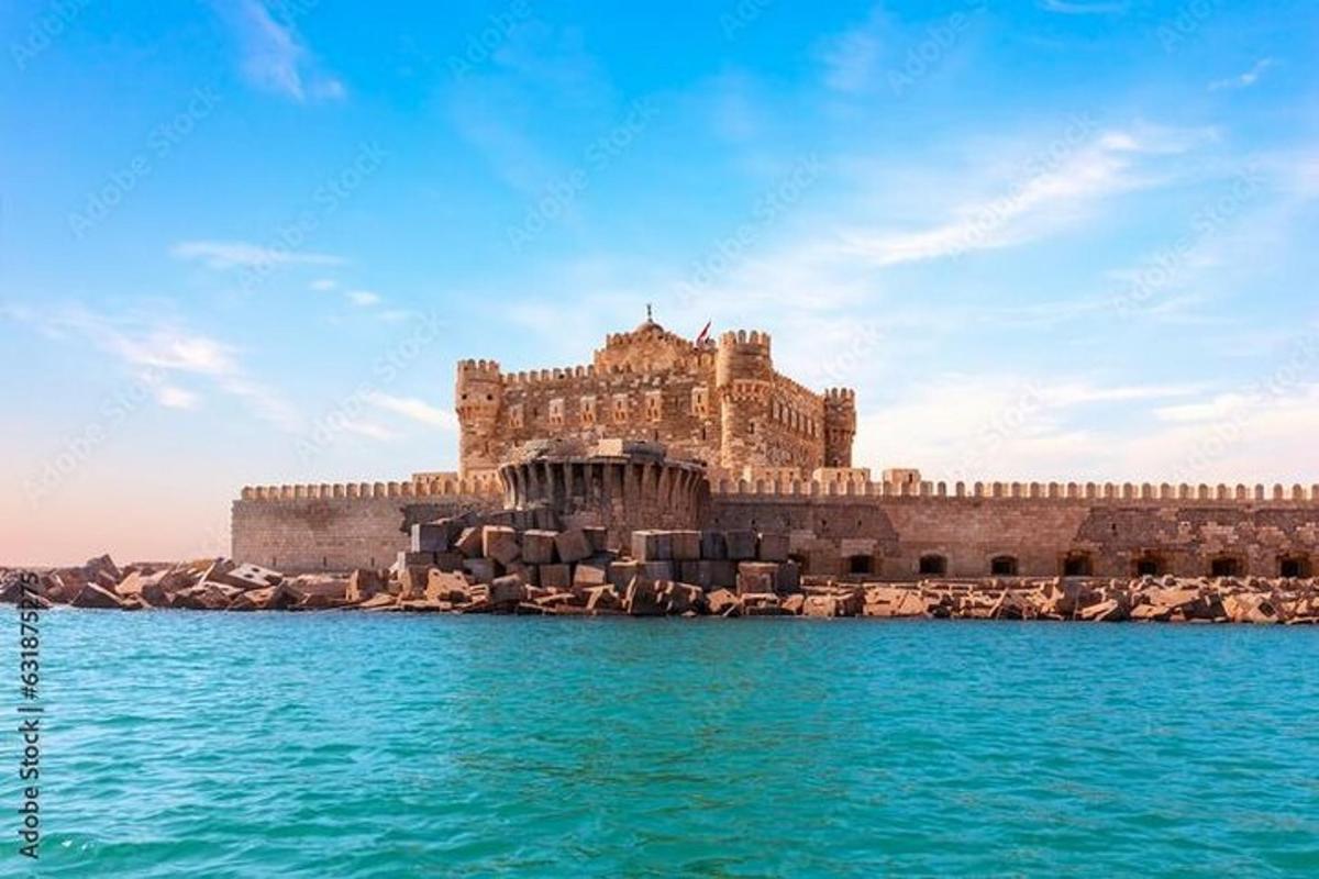 a large castle sitting on top of a body of water