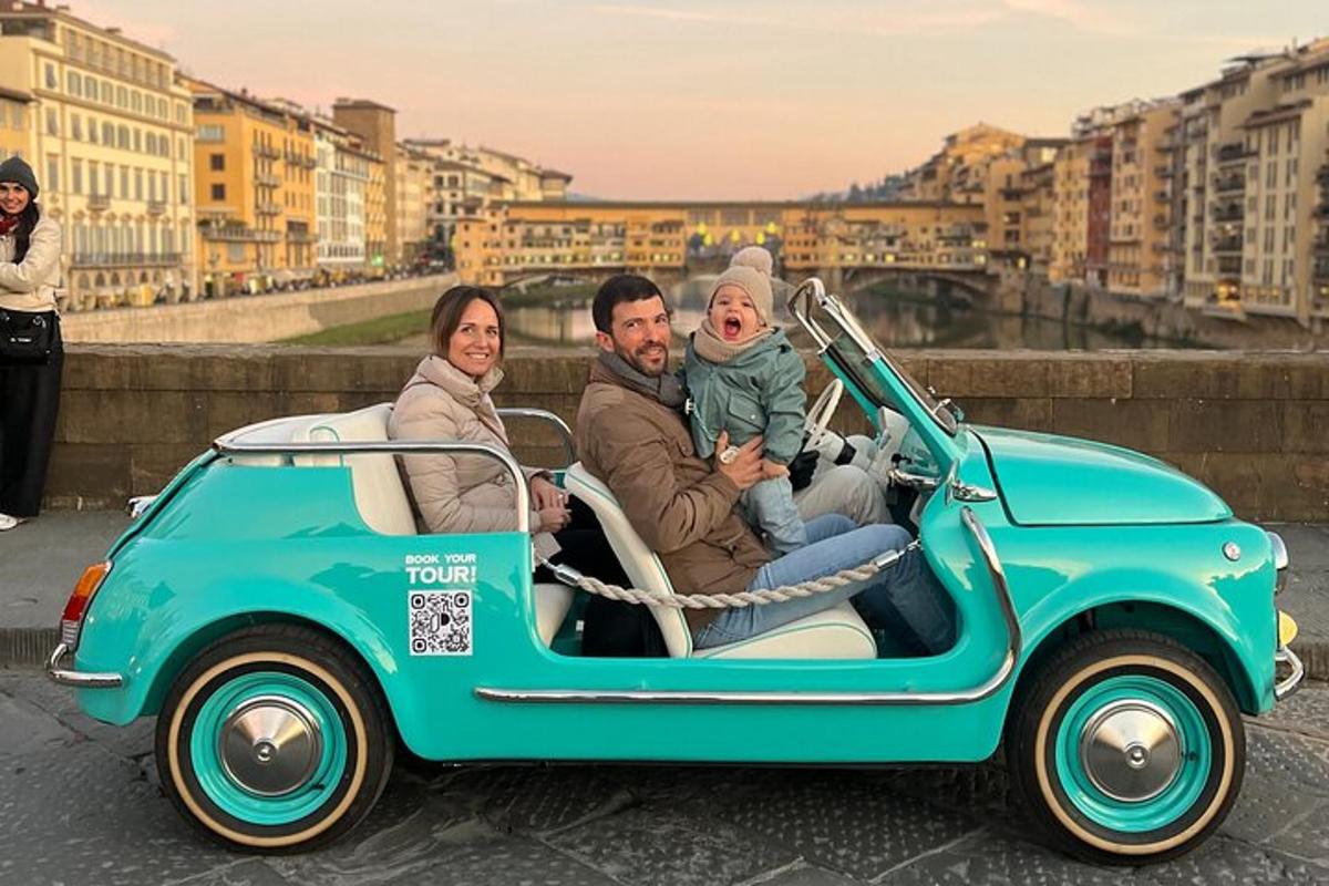 a group of people riding in a small car