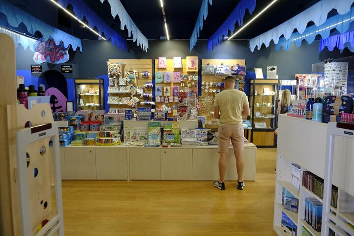 a man is standing in a store aisle