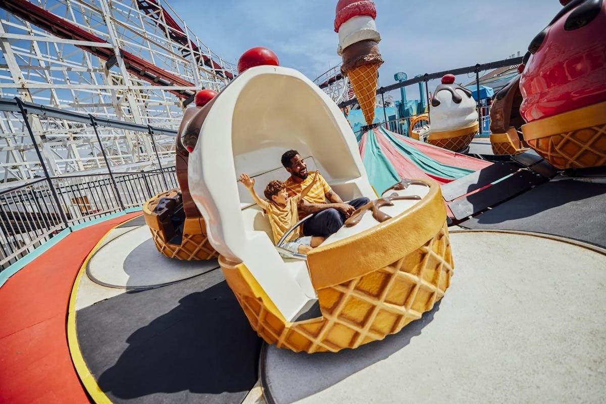 a man riding a roller coaster on a ride on a cruise ship