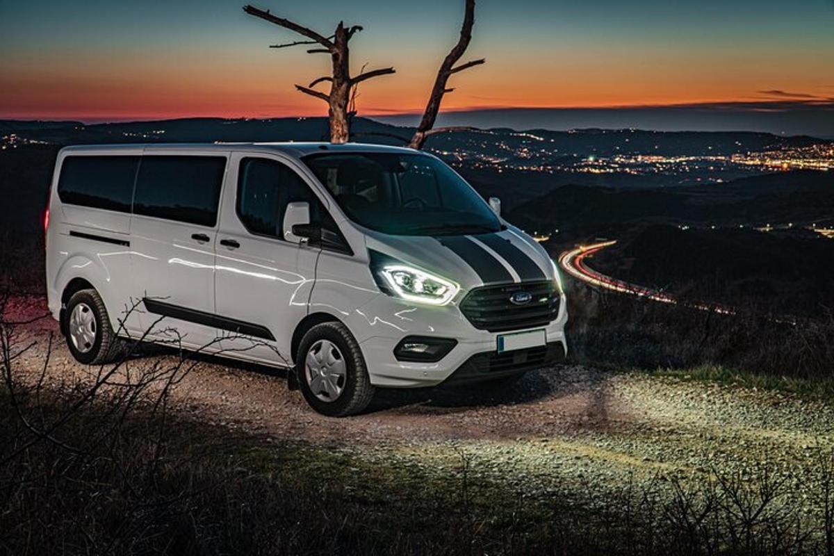 a white van parked on the side of a road
