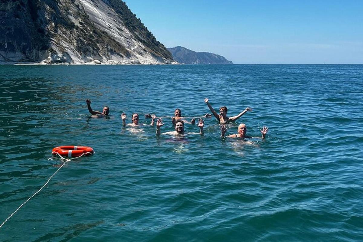 a group of people swimming in the water