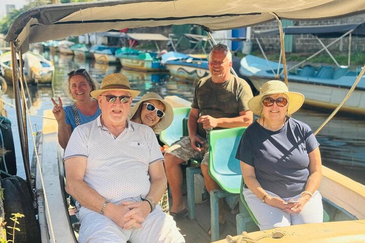 a group of people sitting on a boat