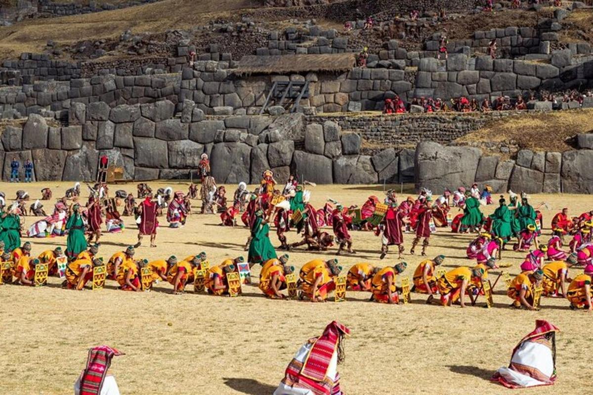 a group of people in colorful costumes on a beach