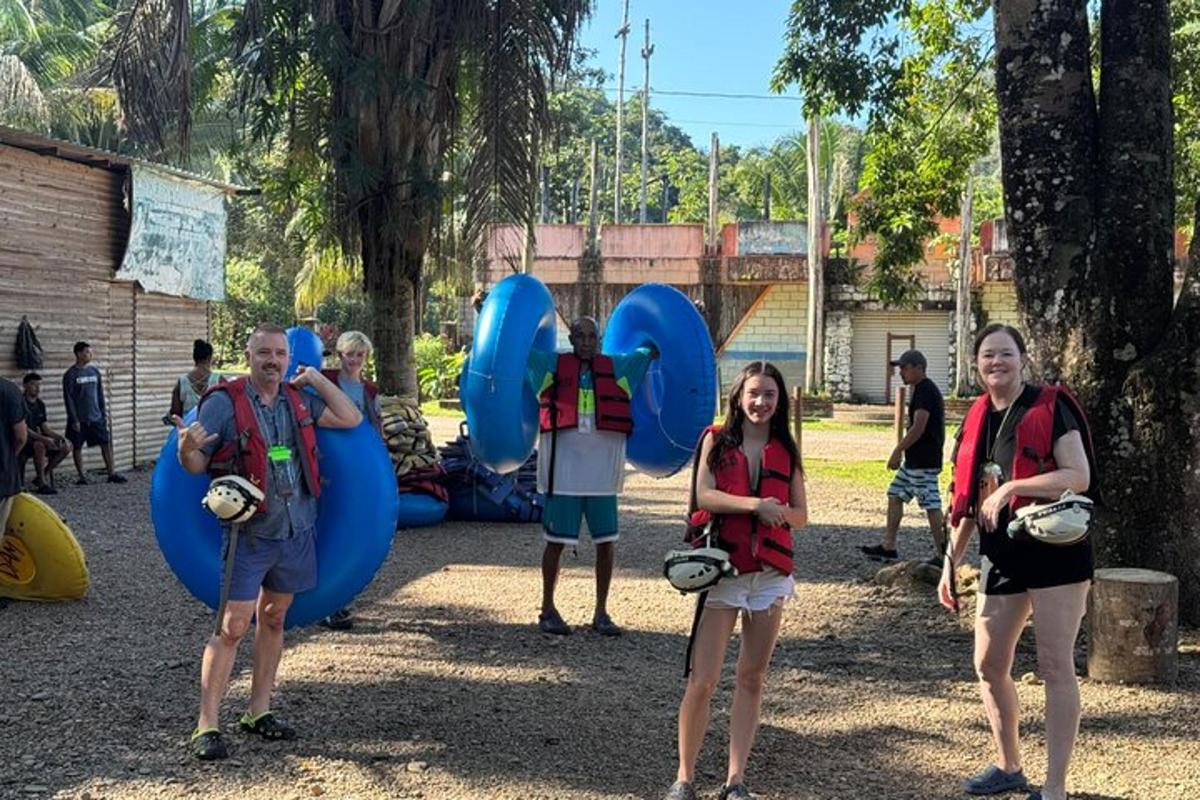 a group of people standing in front of a playground