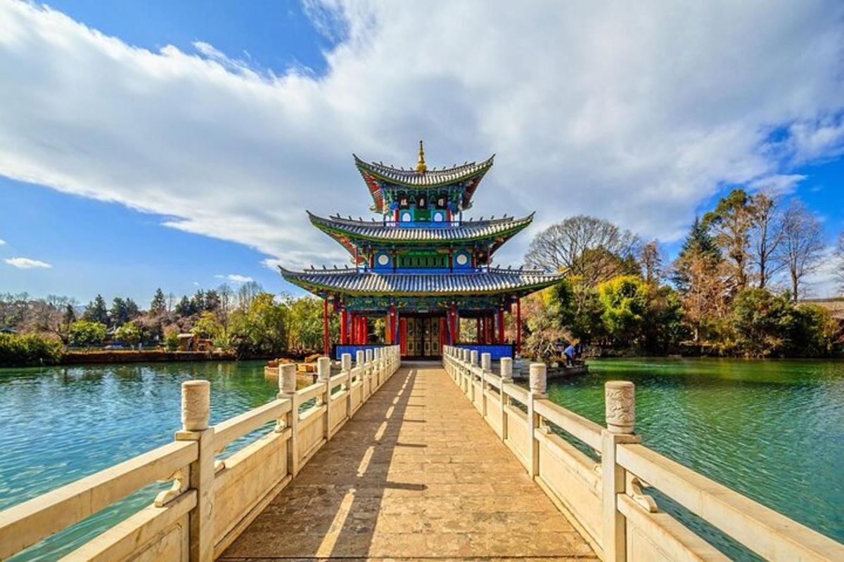 a large building on a bridge over a body of water