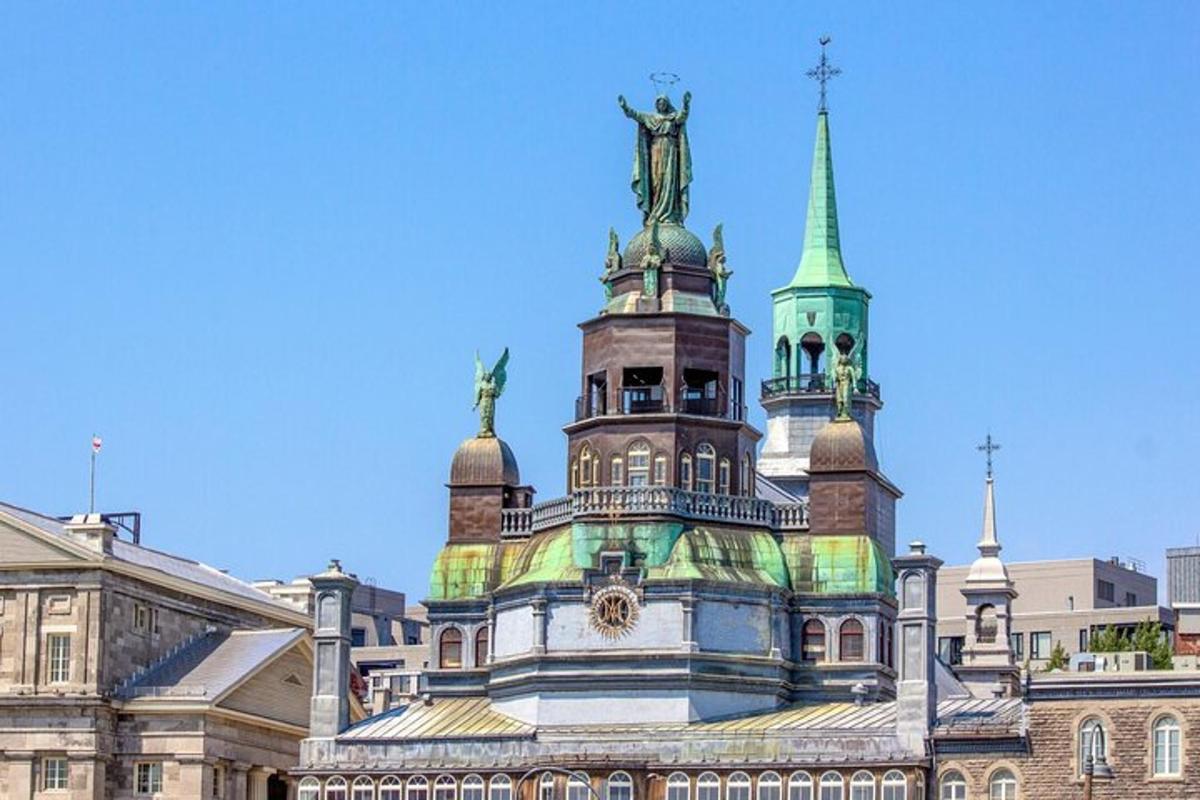 a building with a statue on the top of it