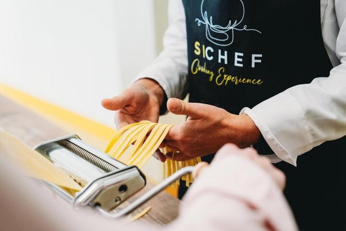 a man is putting pasta into a cell phone