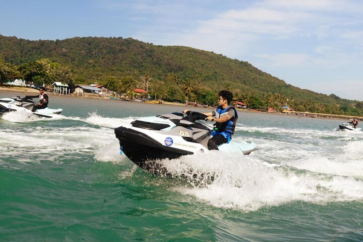 a man riding a jet ski in the water
