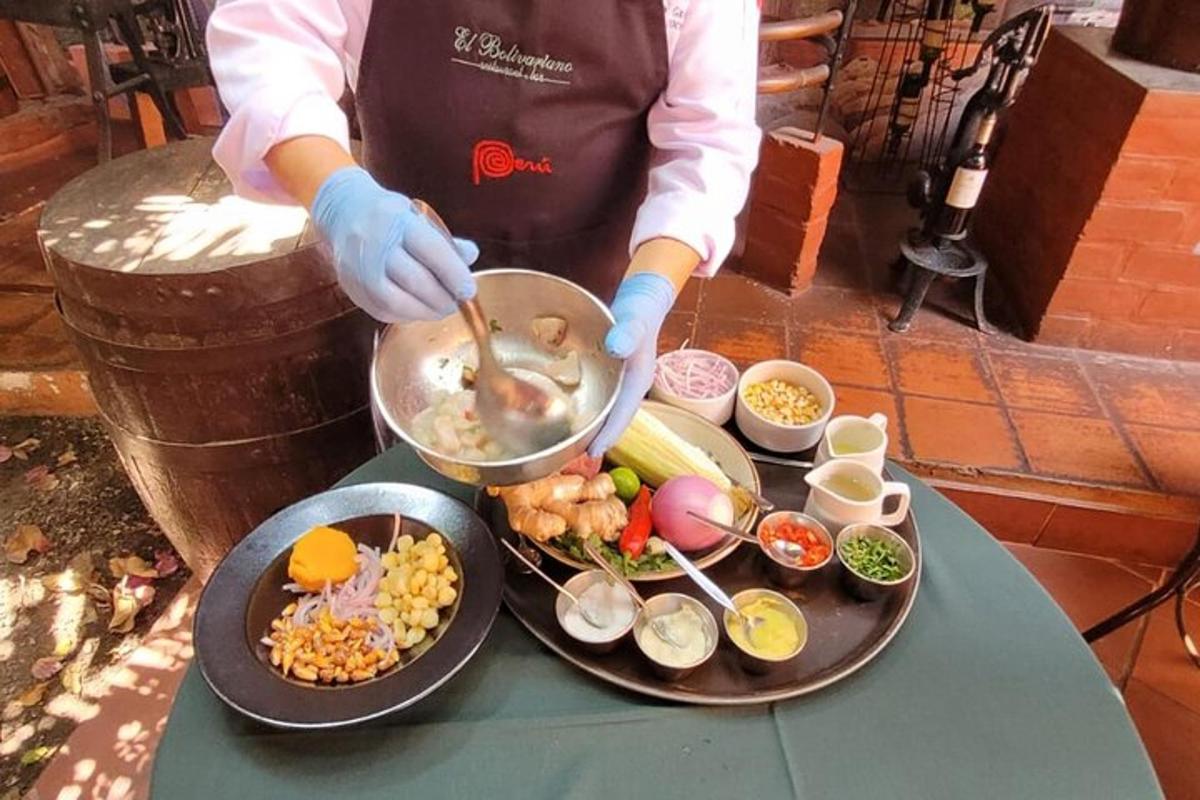 una persona cocinando comida en una mesa con platos de comida