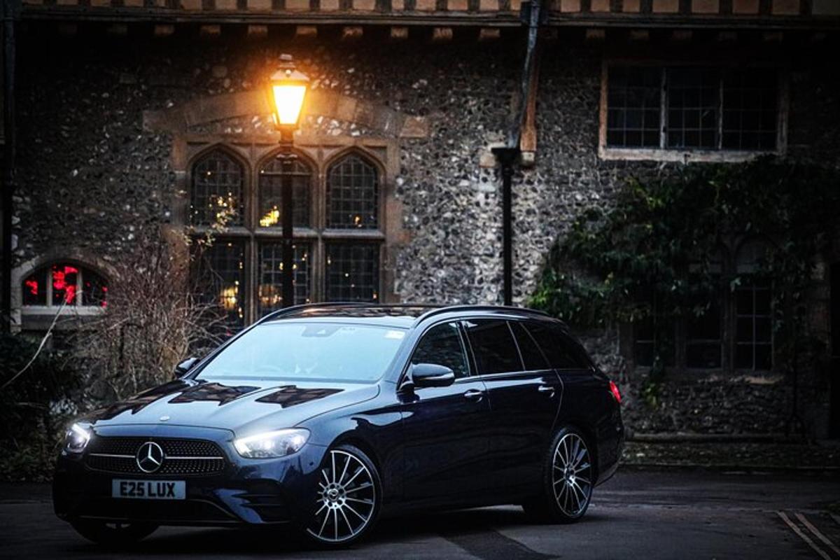 a black car parked in front of a building