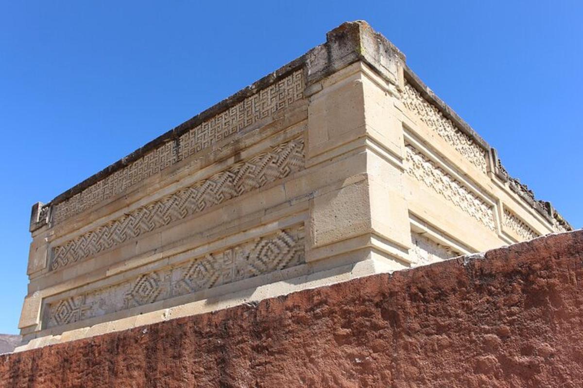 a brick building with a stone ledge on top of it