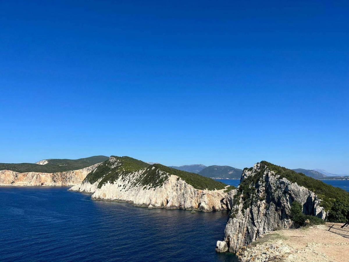 a view of a rocky island in the water