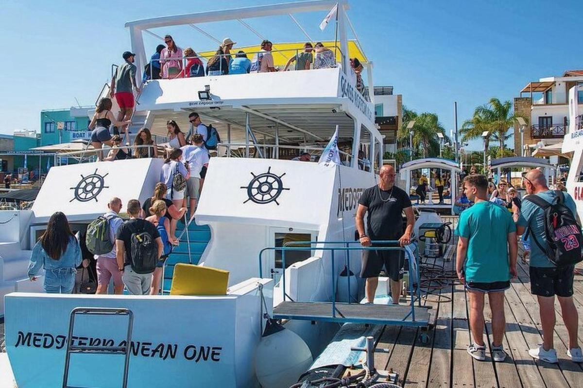 a group of people standing on a boat