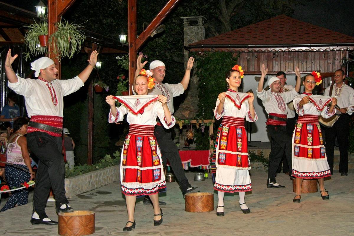 a group of people performing a folk dance
