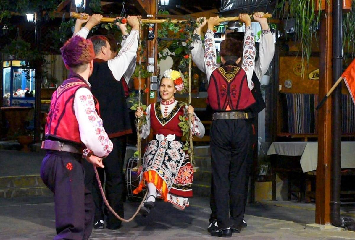 a man and a woman on a swing