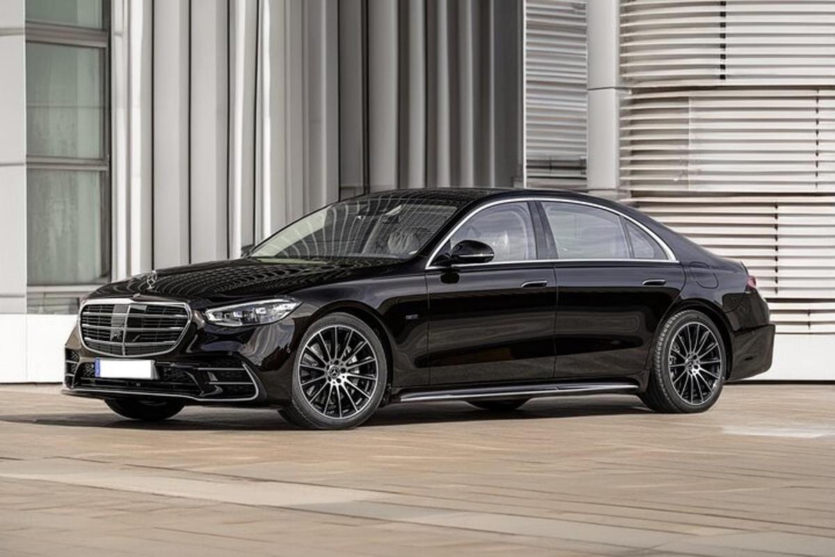a black car parked in front of a building