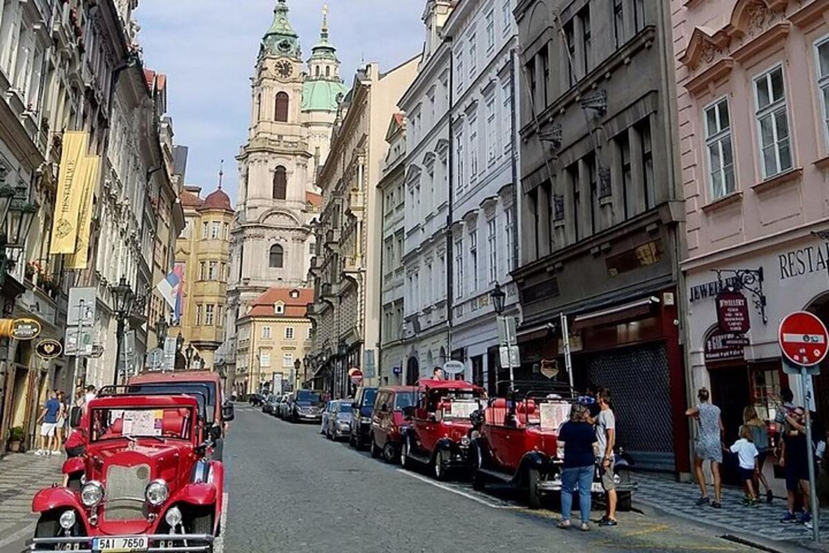 a group of red trucks parked on a city street