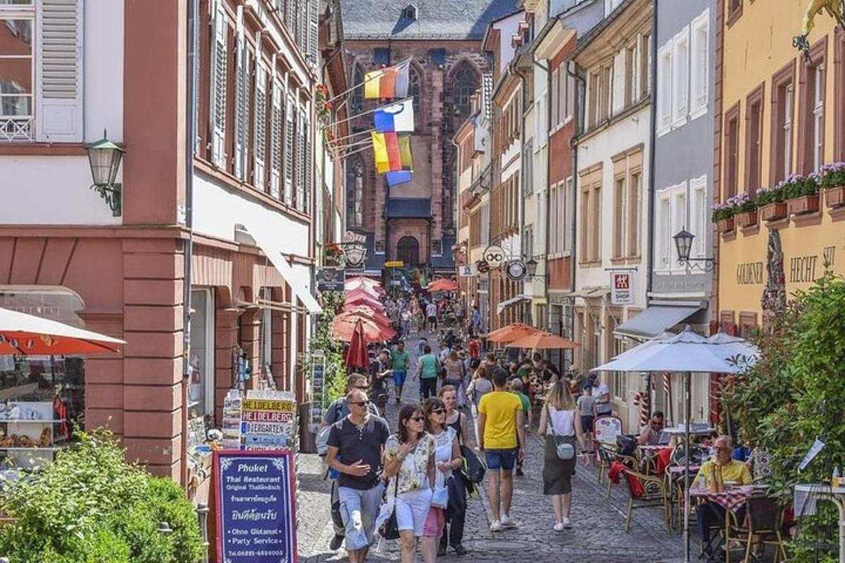 a group of people walking down a city street