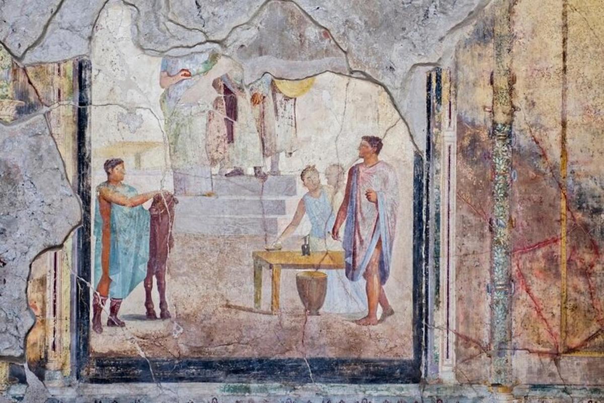 un dipinto di persone in una stanza di una grotta
