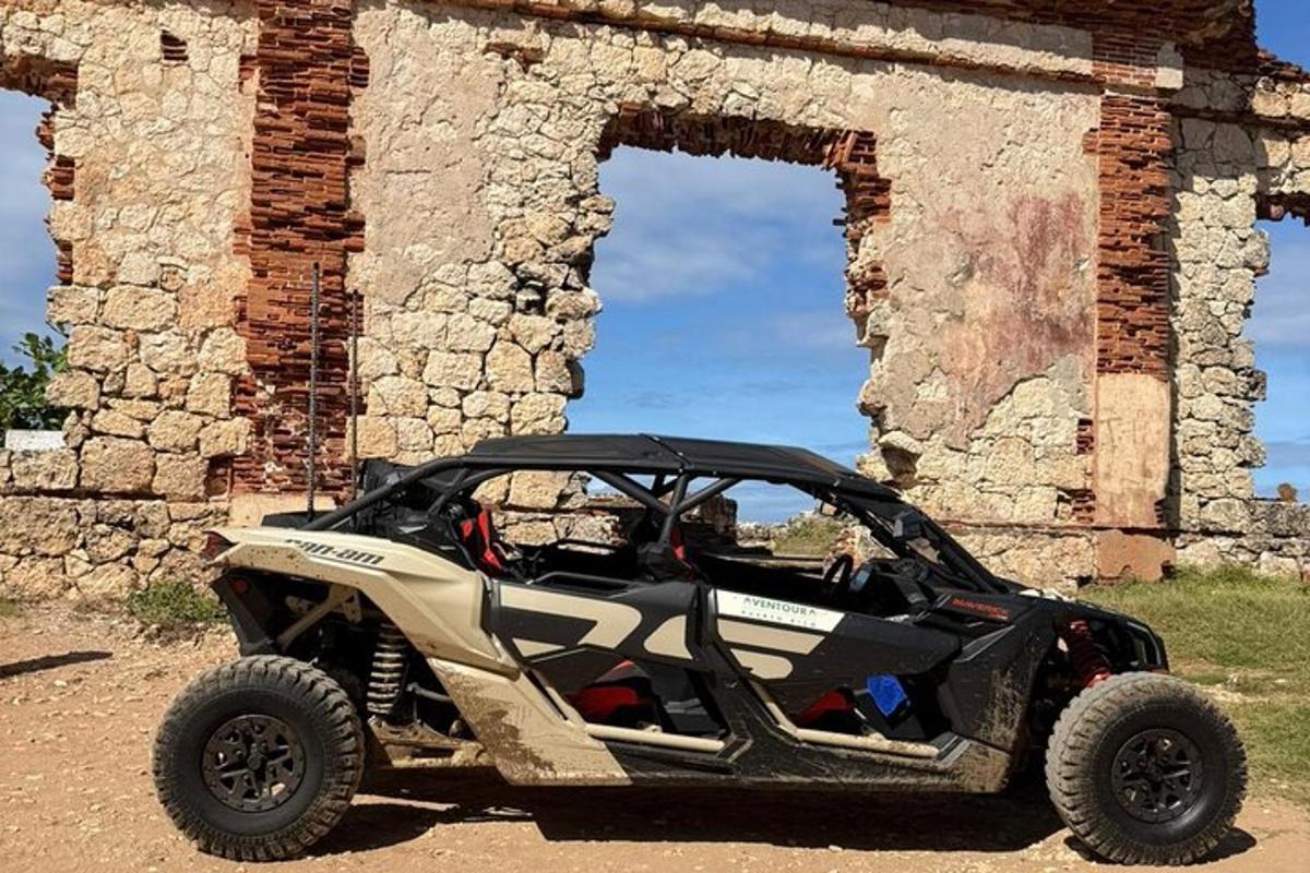 a four wheeled vehicle parked in front of a building