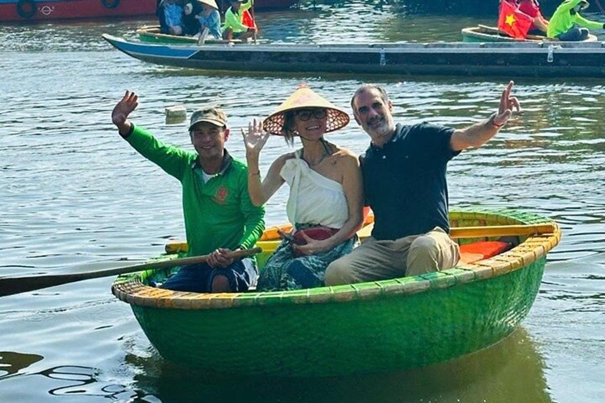 two men and a woman in a boat on the water