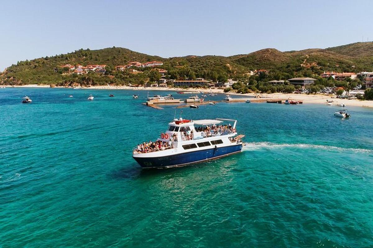 a group of people on a boat in the water