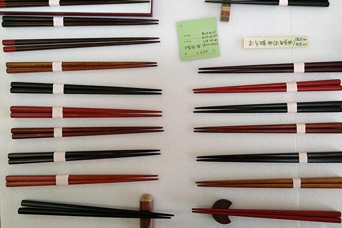 a display of different types of wooden chopsticks