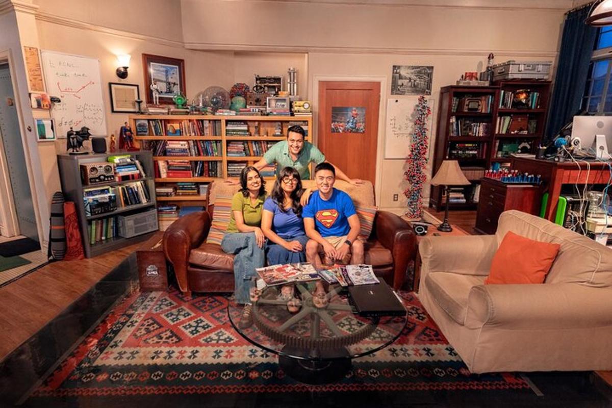 a group of people sitting on a couch in a living room