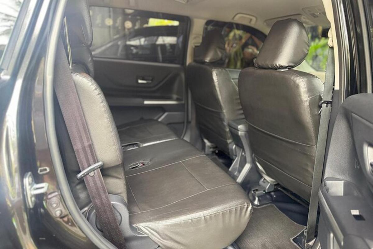 an empty back seat of a car with the back seatsktop