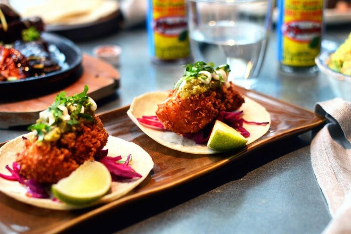 two plates of food on a tray on a table