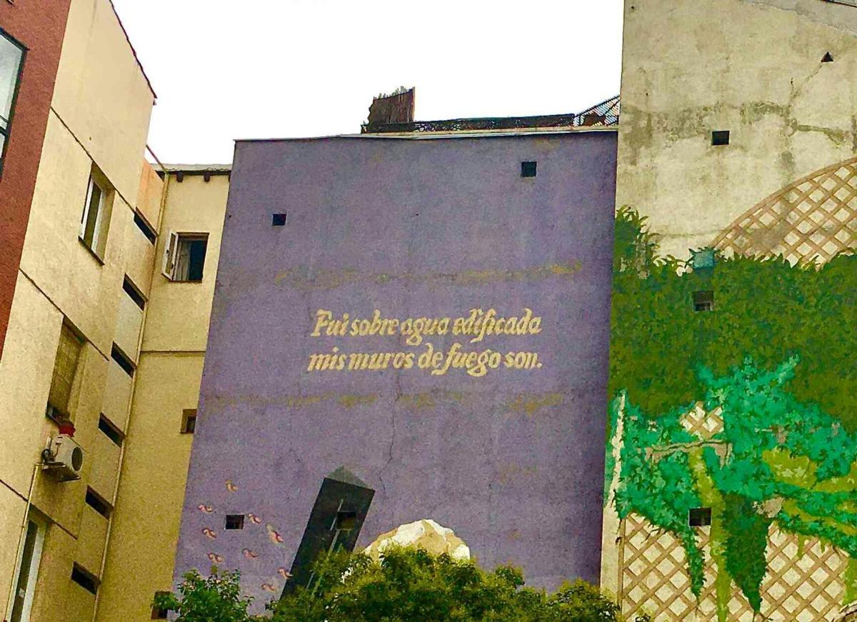 a building with writing on the side of it