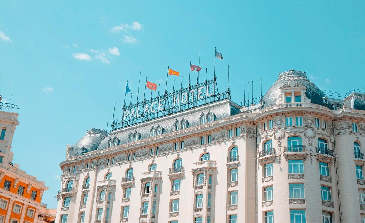 a building with flags on the top of it