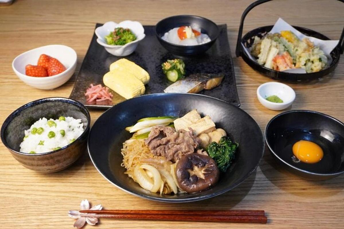 a table topped with bowls of food on a table