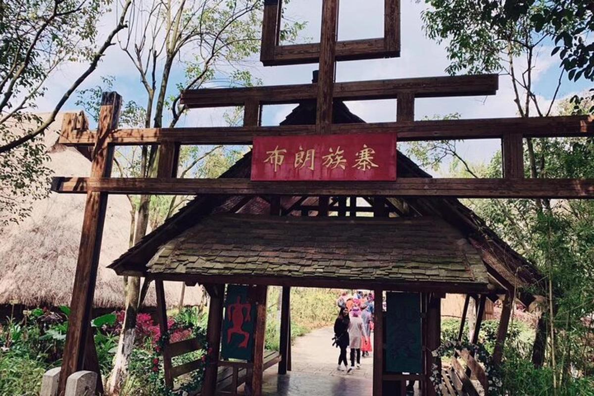 a wooden structure with a cross on top of it