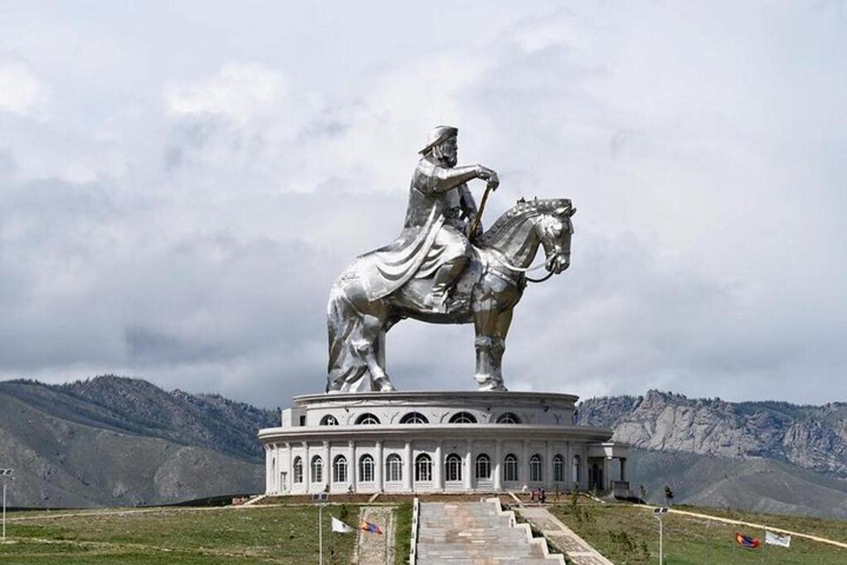 a statue of a man riding a horse